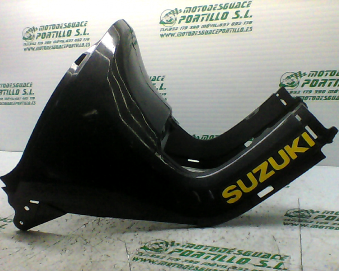 Carcasa bajo asiento Suzuki SUZZY (2000-2002)