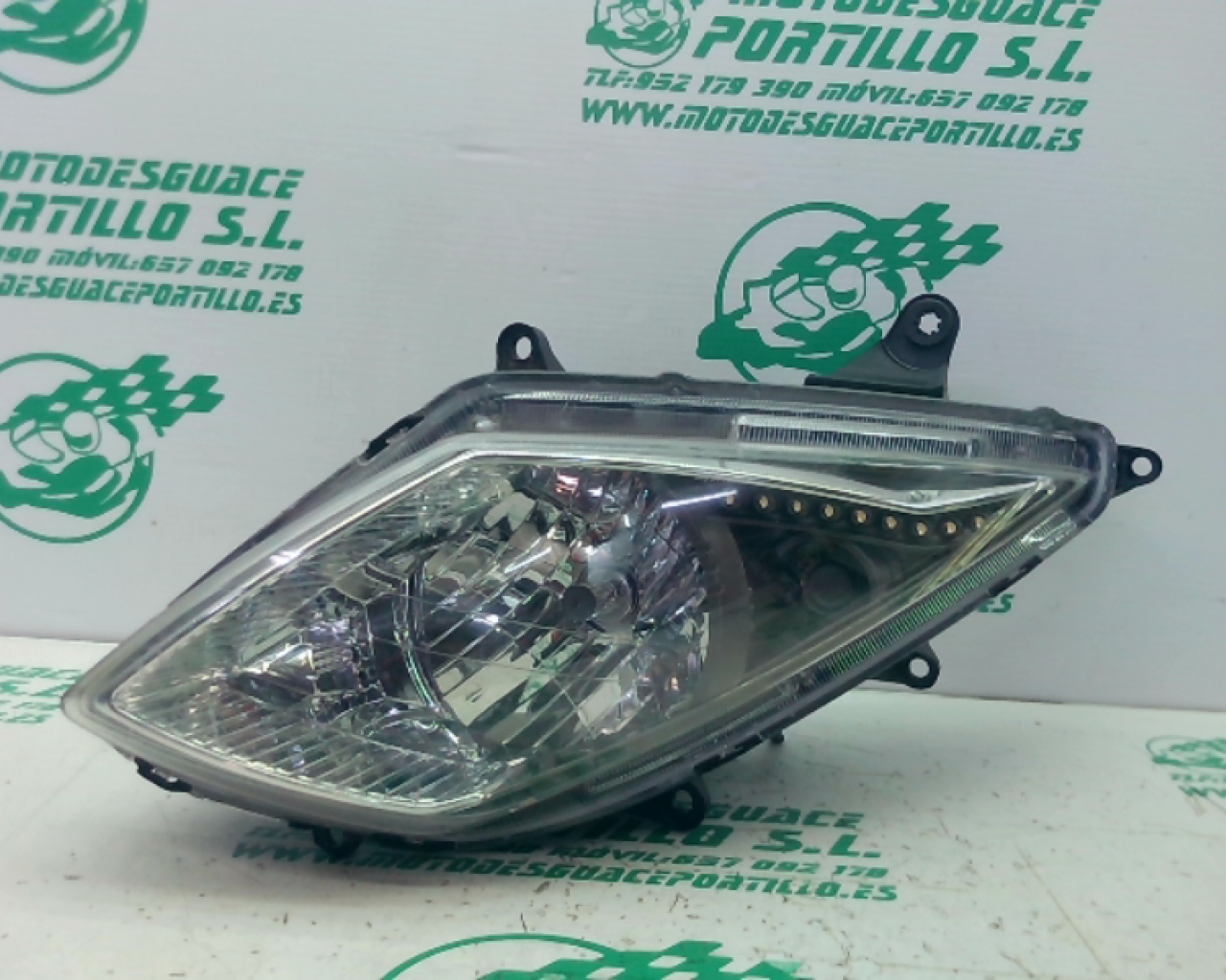 Faro izquierdo Sym JOYMAX 125 GTS (2013-2015)